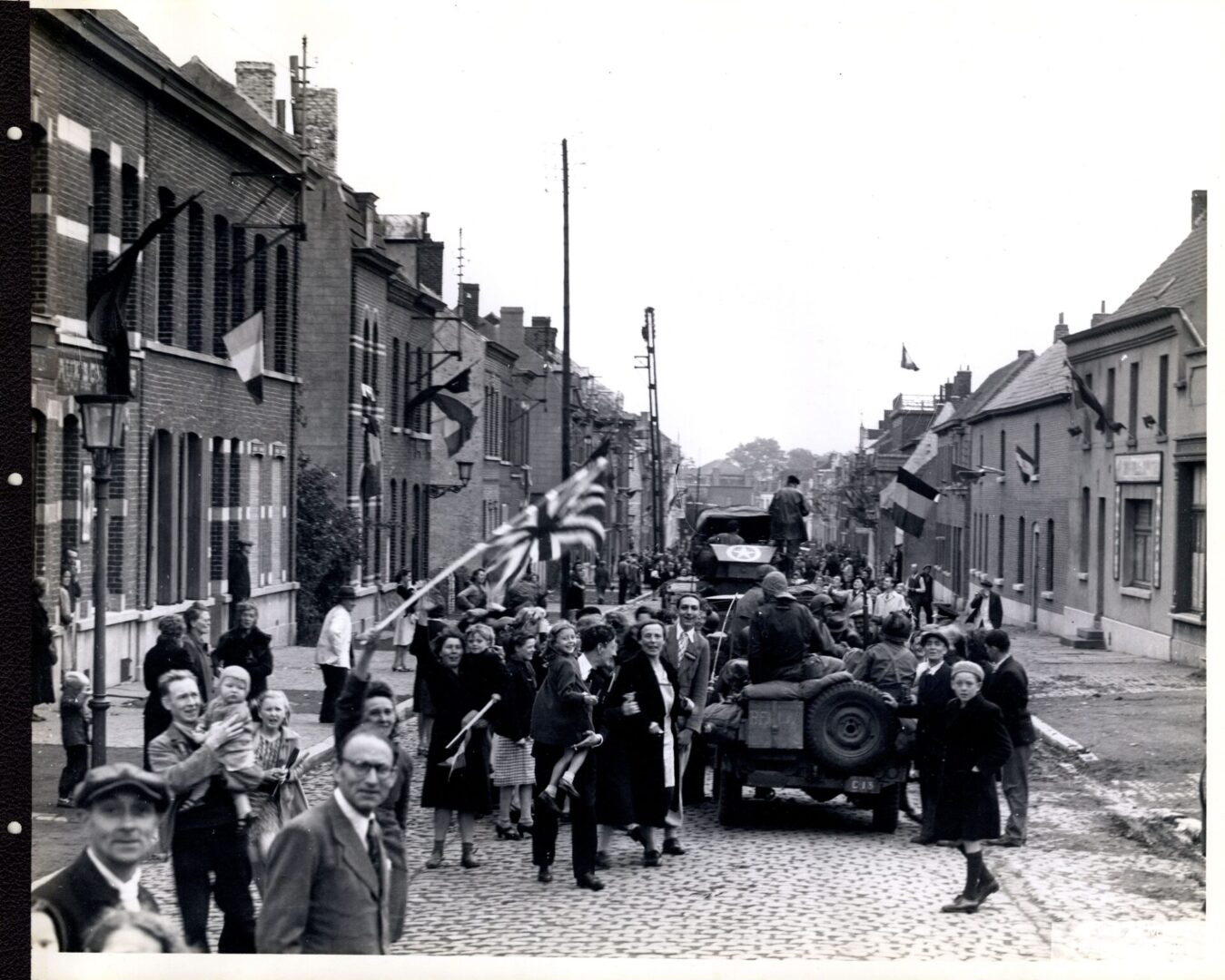 Residents of Couvin, Belgium welcoming the American troops