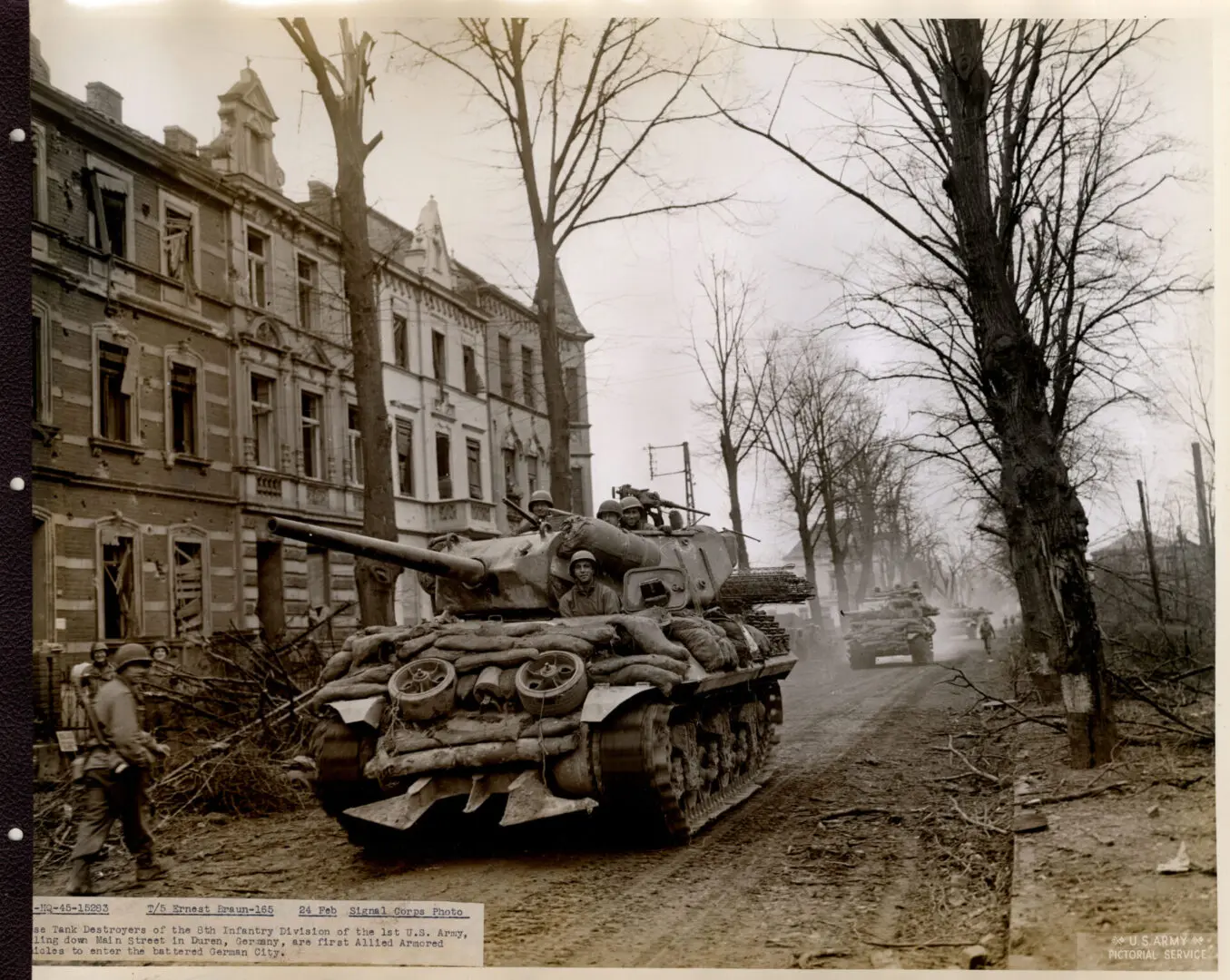 Tank destroyers rolling down the main streets of Duren