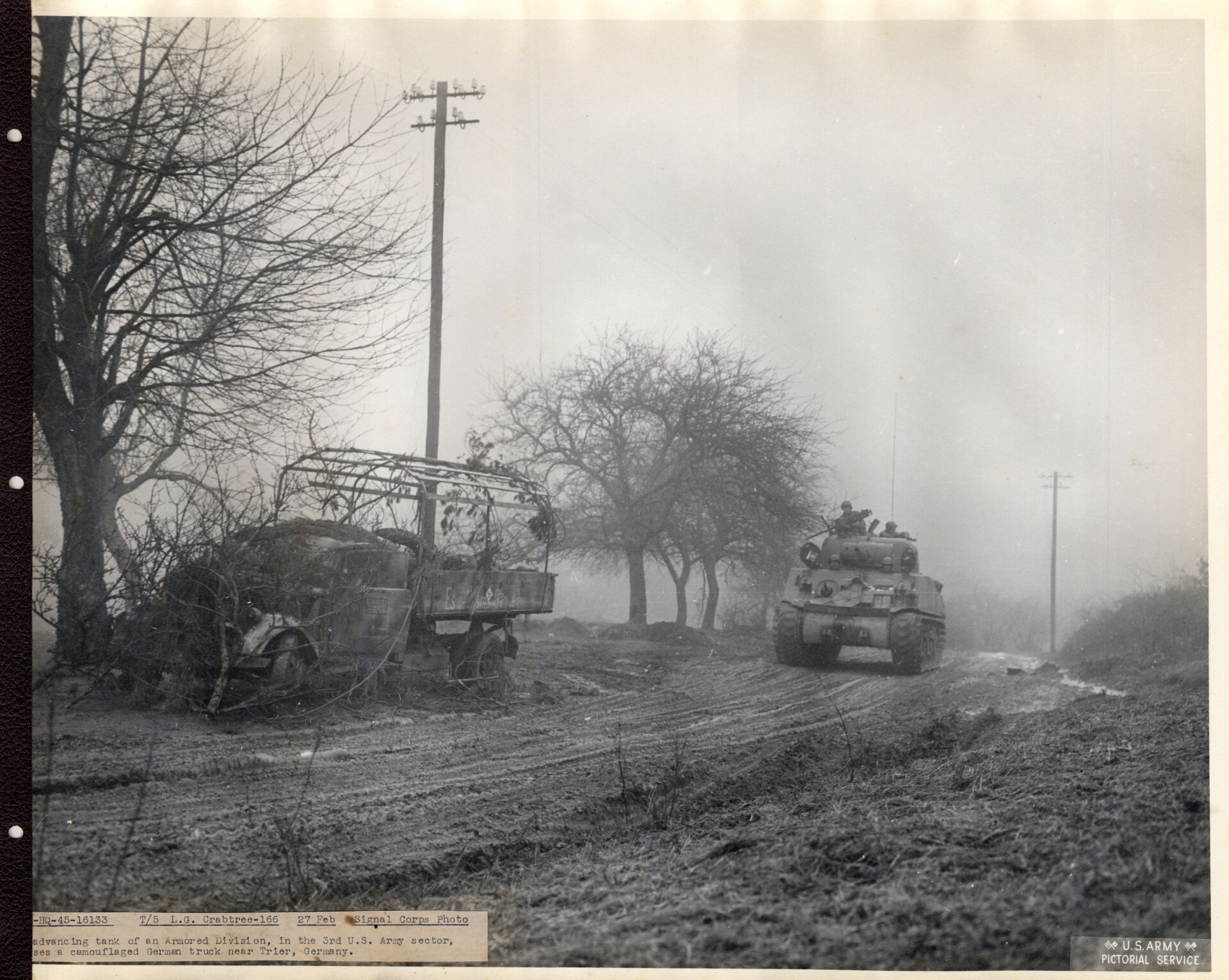 Tanks of armored division passing through German roads