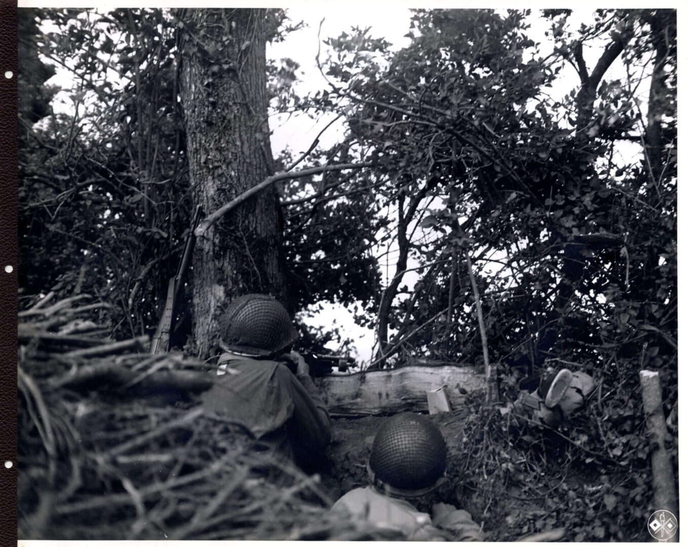 American soldiers take cover during a fierce battle